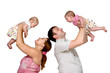 mother and father talking with two babies twin sisters girls