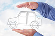 Hand holding car symbolically