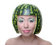 Funny woman with water-melon as helmet