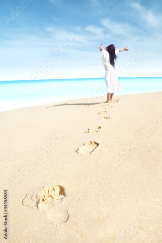 Photo: Carefree woman with footprint Carefree woman with footprint