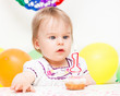 Foto: Little girl celebrating first birthday Little girl celebrating first birthday