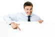 Photo: Businessman showing signboard, on white Businessman showing signboard, on white
