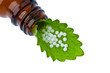 Photo: Homeopathy. Globules as alternative medicine Homeopathy. Globules as alternative medicine