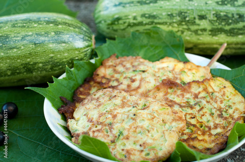 Photo: Pancakes with fresh zucchini on grape leaves Pancakes with fresh zucchini on grape leaves