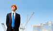 Businessman standing on the construction site