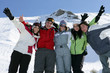 Photo: Group of friends skiing Group of friends skiing