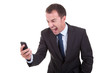 Photo: businessman sreaming on the phone, isolated on white businessman sreaming on the phone, isolated on white