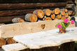 bench with engraved heart and flower vase