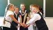 Video: Team of schoolchildren hands putting on each other Team of schoolchildren hands putting on each other