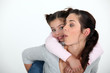 Child riding piggyback