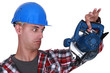 Builder holding circular-saw