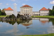 Wasserfontäne mit Schloss Nymphenburg, München