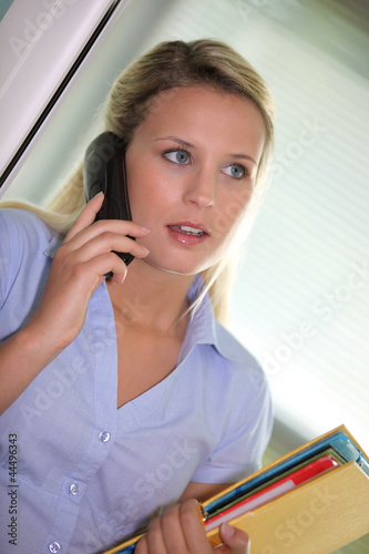 Photo: secretary talking on the phone secretary talking on the phone