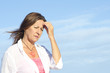 Photo: Thoughtful worried senior woman isolated Thoughtful worried senior woman isolated