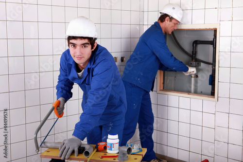 Photo: craftsman and apprentice working together craftsman and apprentice working together