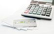 Credit card and Calculator on whit Envelope isolate
