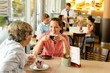 Senior woman with her daughter at cafe