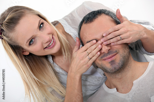 Photo: woman surprising her boyfriend woman surprising her boyfriend