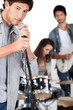 Young man singing in a band