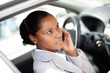 Businesswoman making a call whilst in parked car