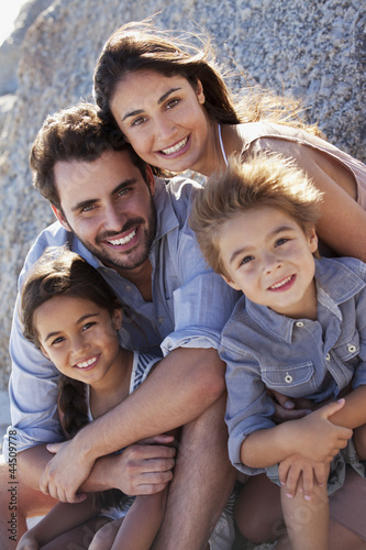 Photo: Portrait of smiling family Portrait of smiling family
