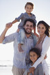 Portrait of smiling family on beach