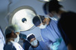 Photo: Surgeons working in operating room Surgeons working in operating room
