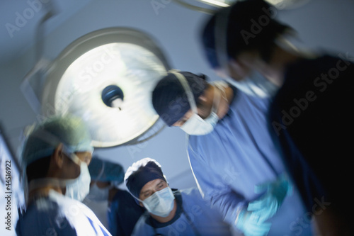 Photo: Surgeons working in operating room Surgeons working in operating room