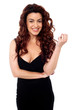 Sexy brunette posing in black party wear attire