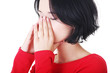 Young woman with sinus pressure pain