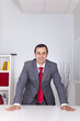 Photo: Powerful businessman at the office Powerful businessman at the office