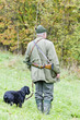 hunter with his dog hunting