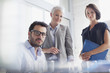 Photo: Portrait of confident business people in office Portrait of confident business people in office