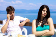 Beautiful woman upset with boyfriend talking with cell phone