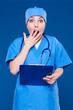 scared nurse covering mouth with hand