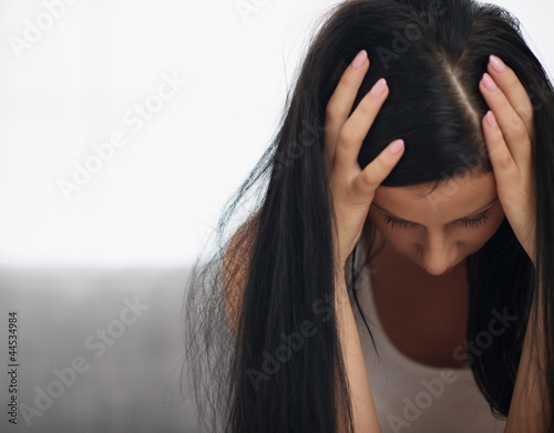 Photo: Young woman in stress Young woman in stress