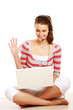 A woman with a headset communicating in chat