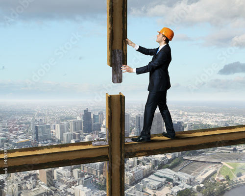 Photo: Businessman standing on the construction site Businessman standing on the construction site