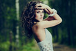 beautiful girl in a wild forest