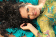 Portrait of a beautiful young lady smiling, brunette woman