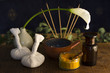 An arrangement of , spice, oil and massaging tools used in Ayurv