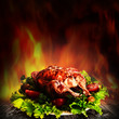 Grilled chicken over salad on the wooden desk