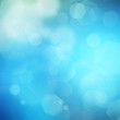 Light winter style abstract Christmas background with snowflakes
