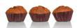 Fresh muffins isolated on white