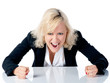 Young business woman screams on white background