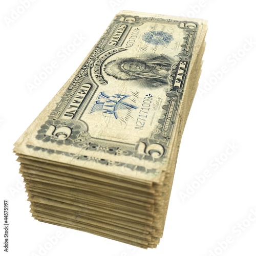 Photo: stack of vintage American money isolated on white background stack of vintage American money isolated on white background