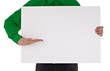 man in shirt holding blank sign