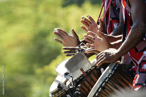 Photo: Hands beating drums Hands beating drums