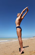 Photo: Young man in strong stretching yoga pose Young man in strong stretching yoga pose