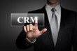 Foto: businessman pressing virtual button - CRM businessman pressing virtual button - CRM